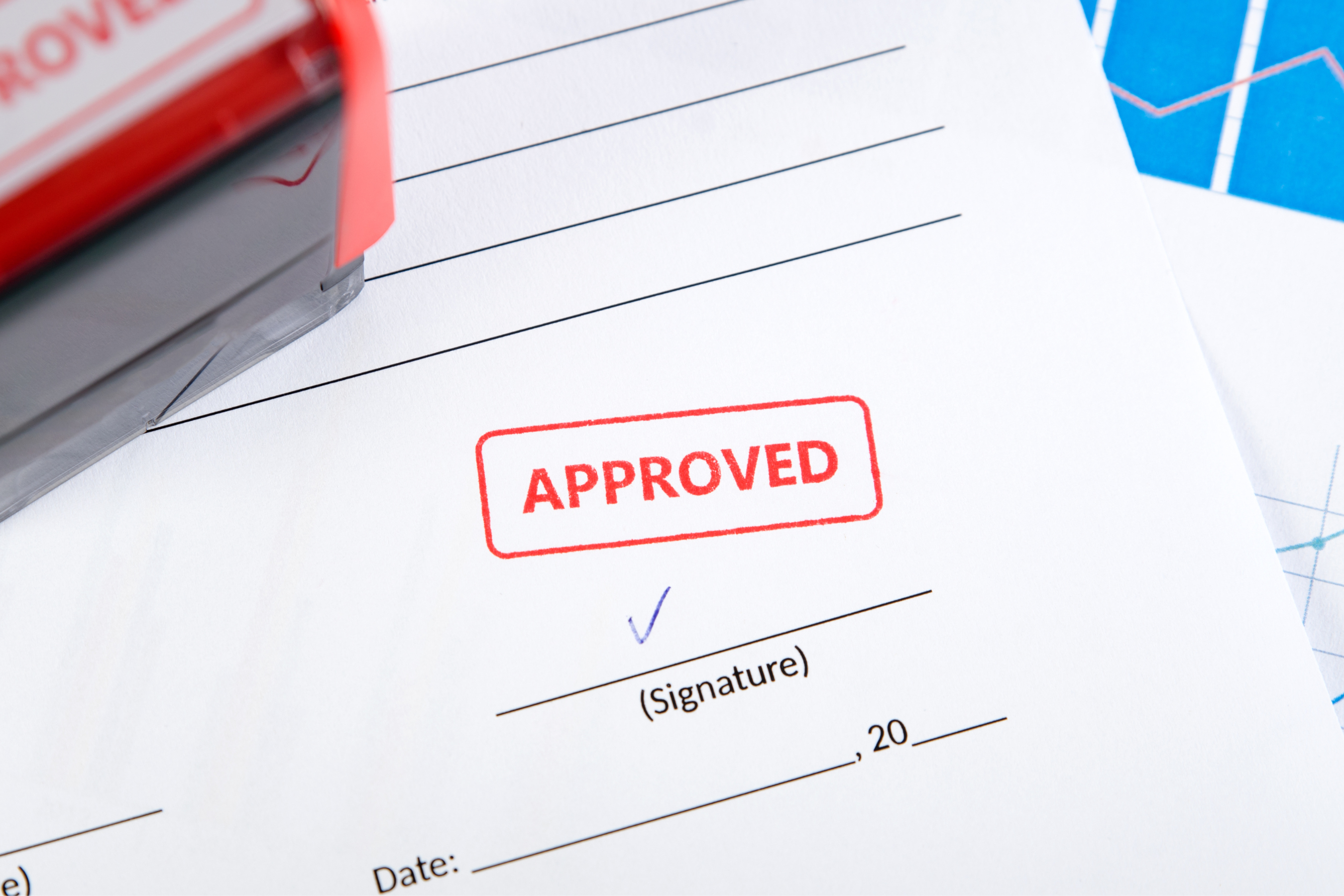 application with a red 'approved' stamp